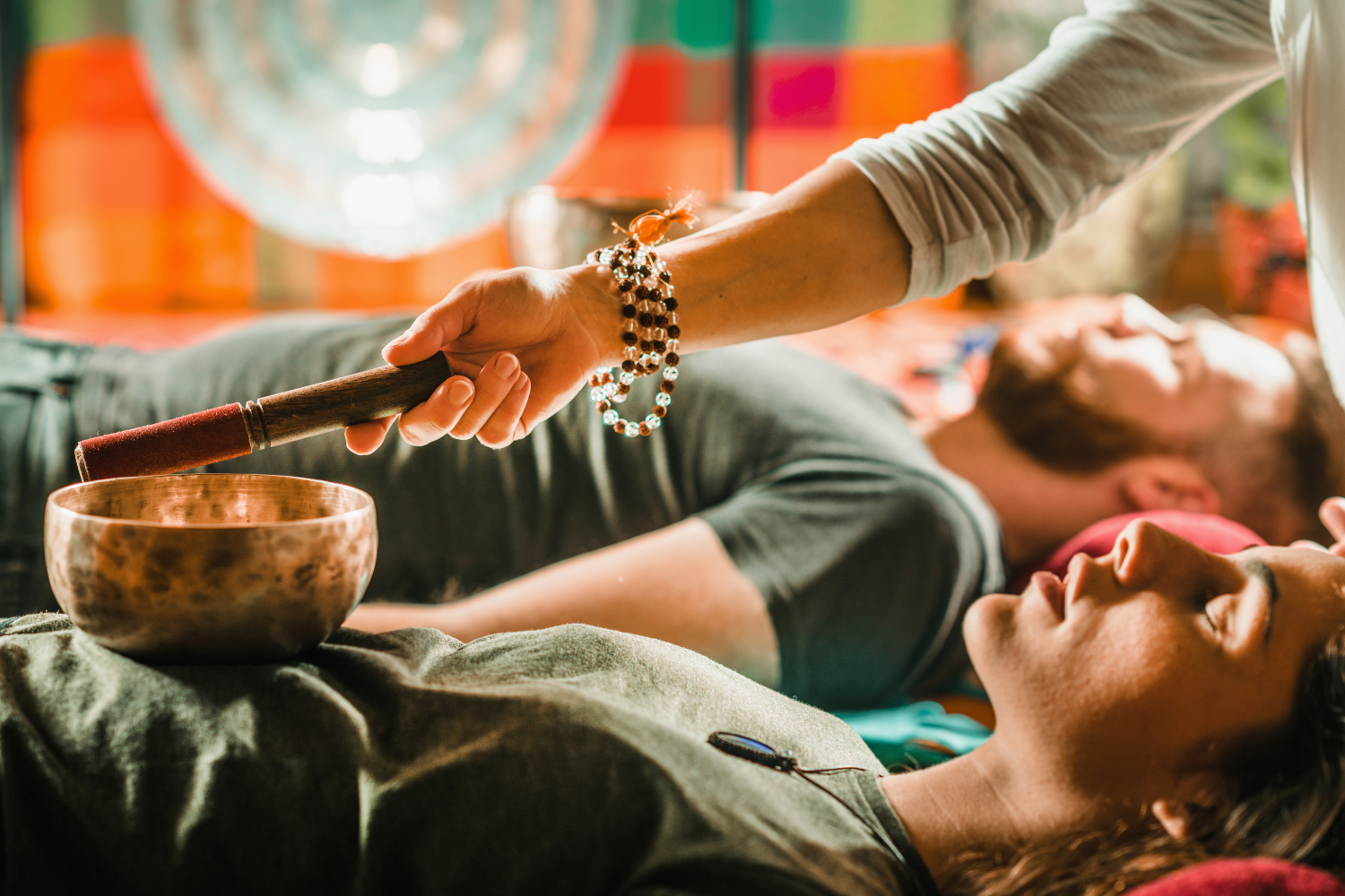 woman having a gong sound bath